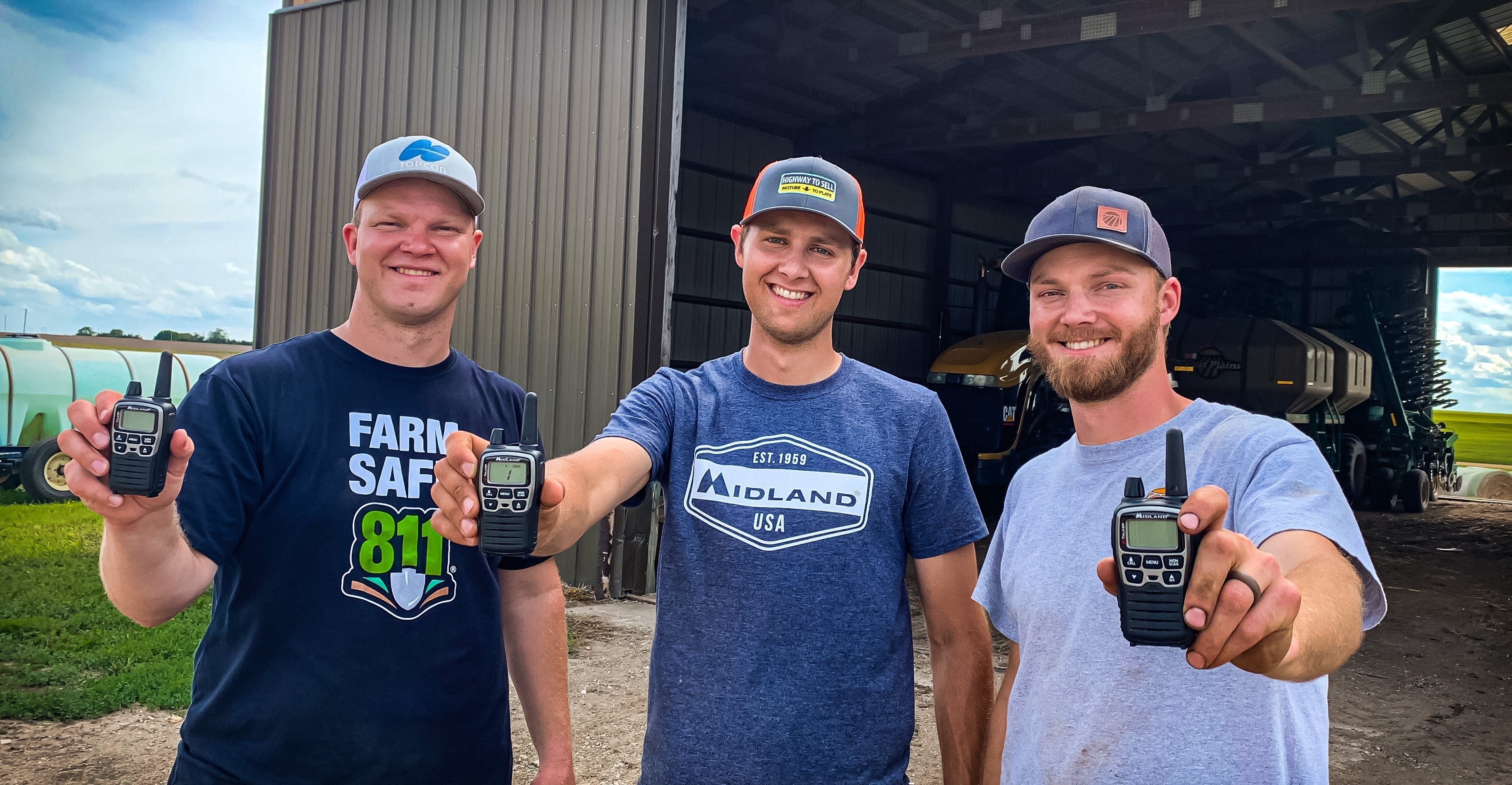 Peterson Farm Brothers hold up walkie talkies