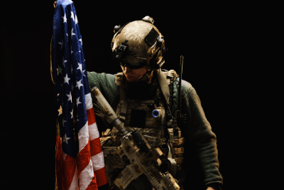 veteran holds American flag