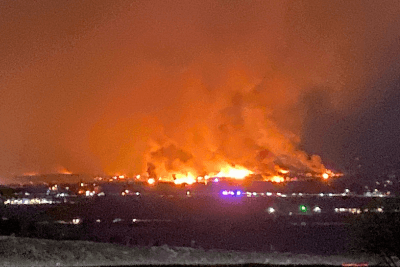 wildfire rages