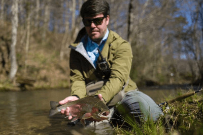 man holding fish