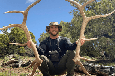man stands with hunting prize