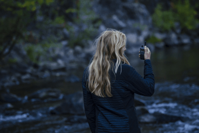 woman uses walkie talkie