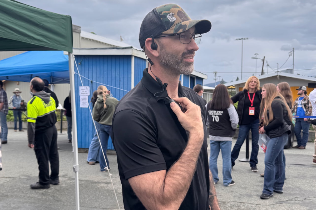 man uses ClipTalk micro two-way radio
