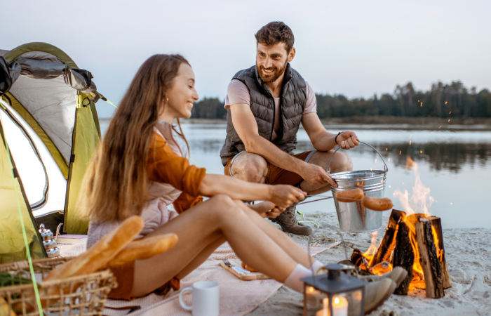 man and woman at campsite