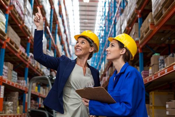 two women in warehouse