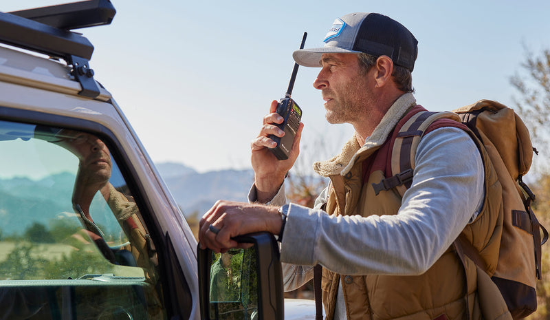 man holds CB radio