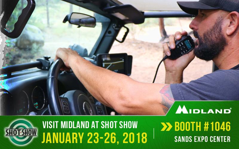 man in Jeep with SHOT show graphic