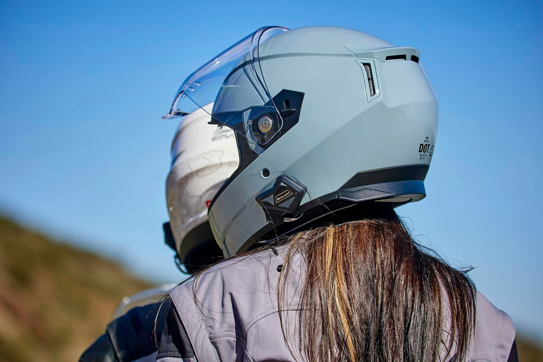 woman in motorcycle helmet