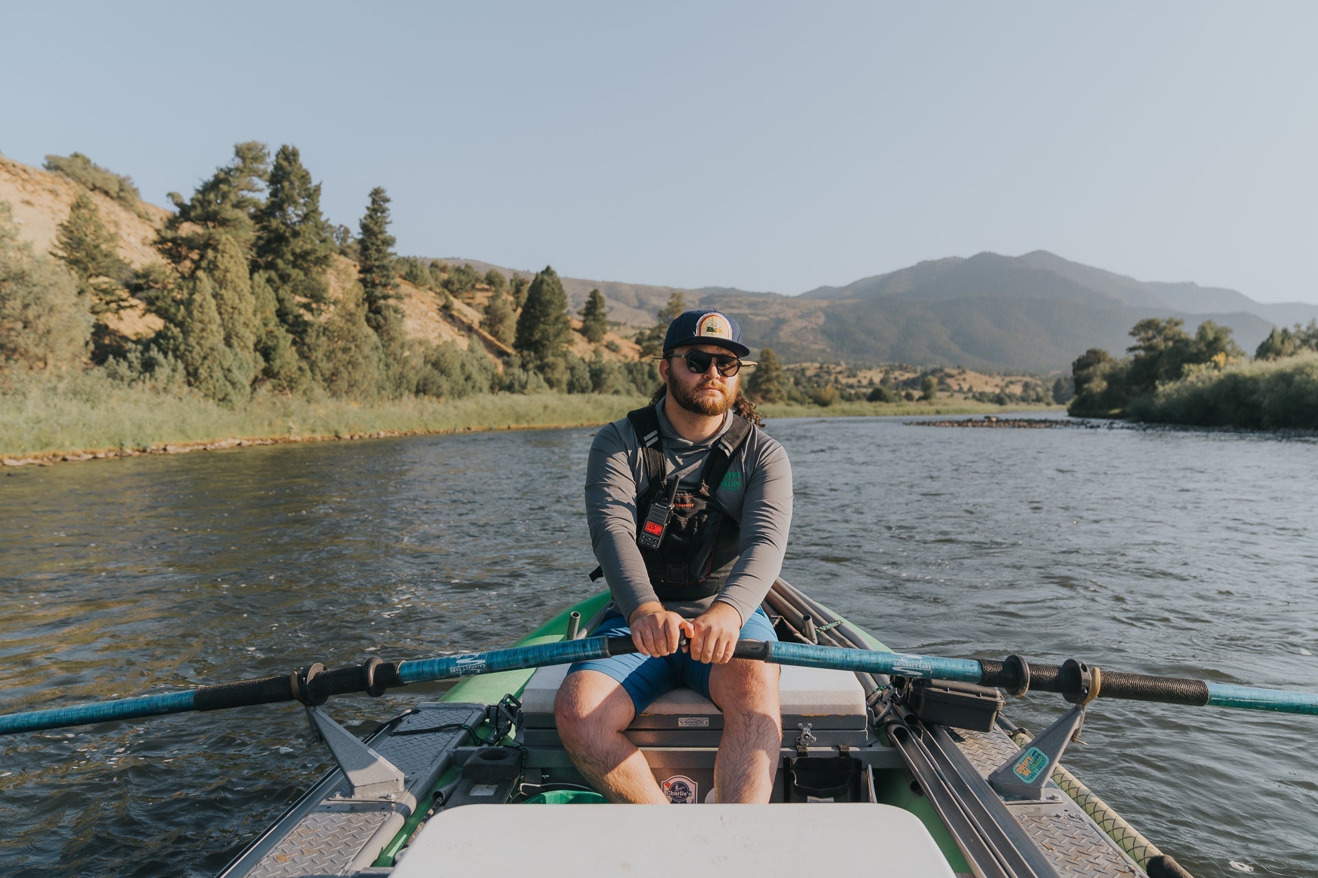 man on kayak with walkie talkie