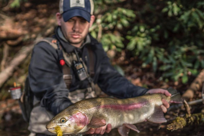 man holds fish