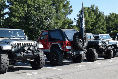 Jeeps lined up in parking lot
