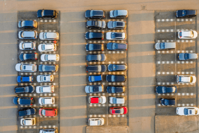 cars lined up in parking lot