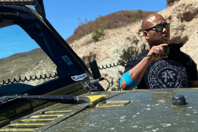 man uses MicroMobile mic outside vehicle