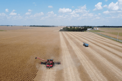 farm with tractors in field