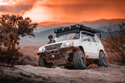 overlanding vehicle at sunset