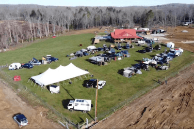 overlanding vehicles on grass