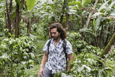 man hiking in forest