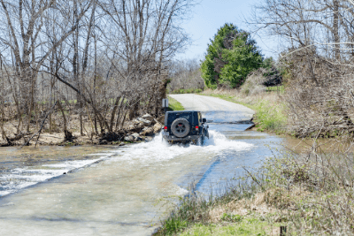 Jeep goes over water crossing