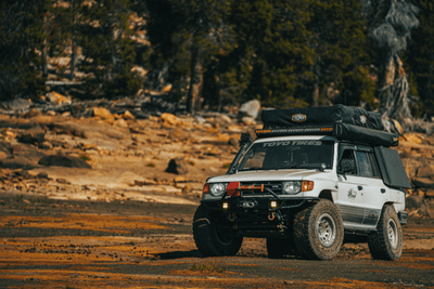 overlanding vehicle on red dirt