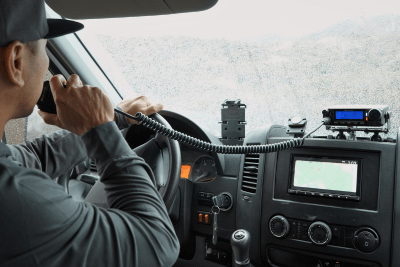 driver uses a Midland Mobile GMRS two-way radio in his van