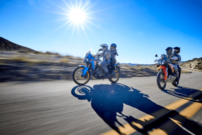 motorcyclists ride on highway