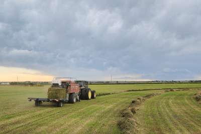 tractor in field on farm in Colorado