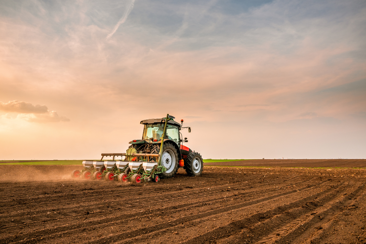 planting season tractor in field
