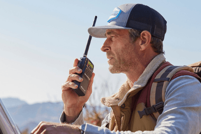 man holds CB radio