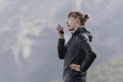 woman uses walkie talkie
