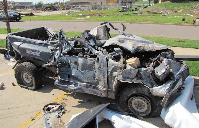 tornado damaged car