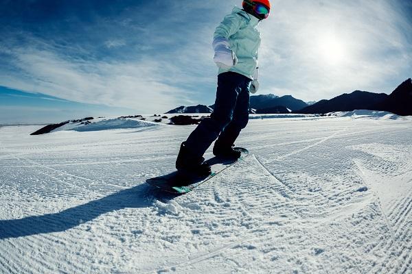 snowboarder on snowy mountain