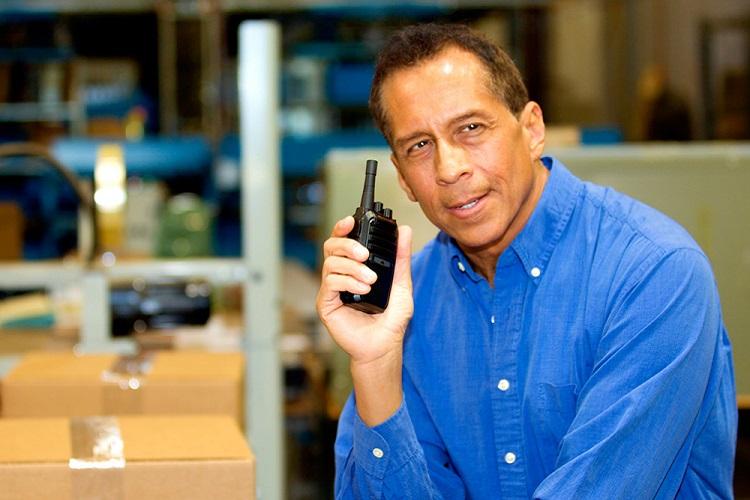 man uses business radio
