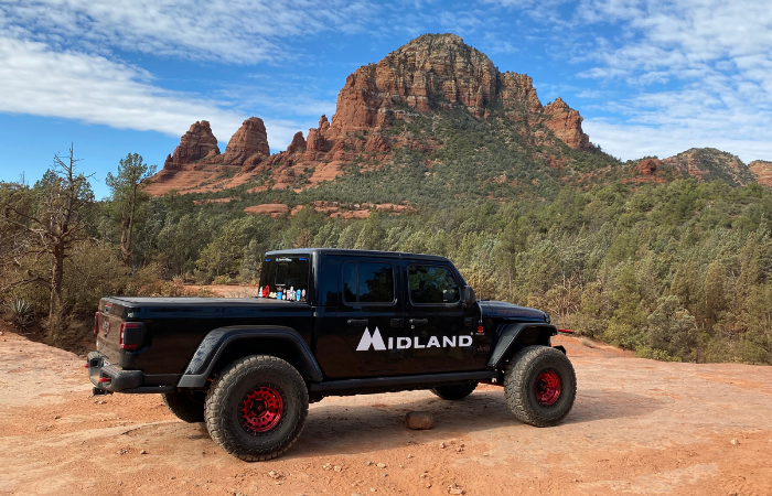 Jeep near rock formation