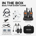 Midland walkie-talkie set shown with included accessories on a light gray background: a pair of handheld radios on a charging dock, two USB-C cables, a 12V car adapter, a surveillance earpiece, two clip-in radios, rechargeable battery packs, and a black carrying case. Large text at the top reads 'IN THE BOX BUILT FOR EVERY GAME.