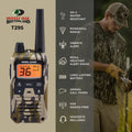 Midland Mossy Oak Bottomland T295 walkie-talkie shown on the left, with a man in camouflage clothing holding a phone on the right. A vertical list of features runs down the center, including JIS-4 water resistant, powerful range, vibrate alert, NOAA weather alert radio, long lasting battery, animal call tones, VOX hands-free, and headsets included.